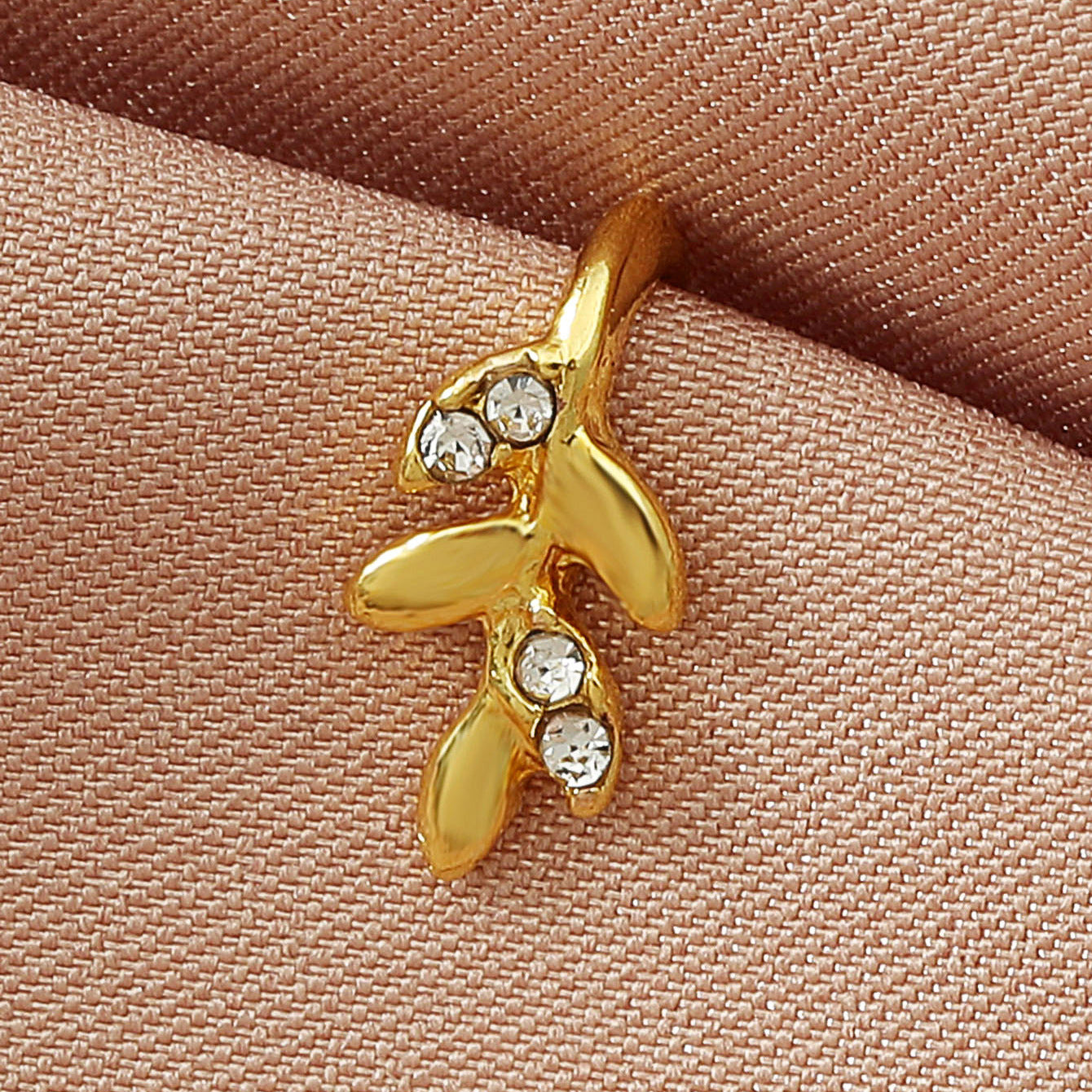 Zircon U-Shaped Leaves Heart Nose Studs with gold finish and sparkling zircon accents